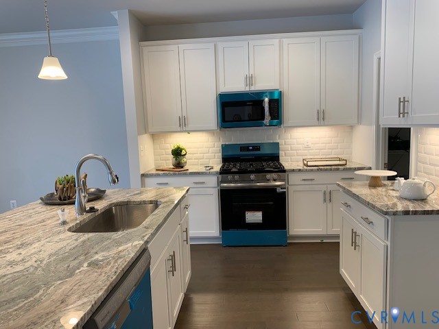 8102 Side Spring Terrace Henrico, VA 23294 - Photo 9 of 20 a kitchen with appliances a sink and cabinets