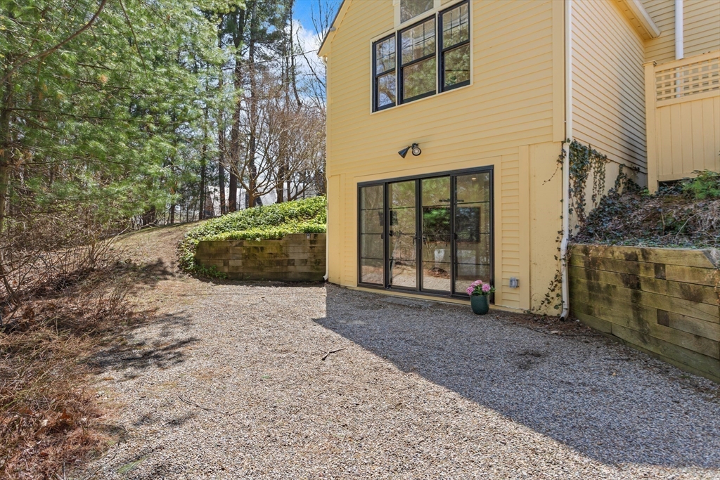 37 Independence Road Concord, MA 01742 - Photo 30 of 34 a view of a house with a yard