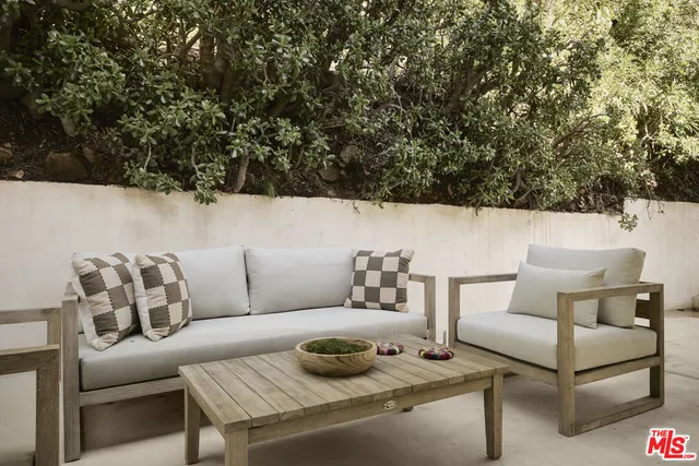a view of a living room with furniture
