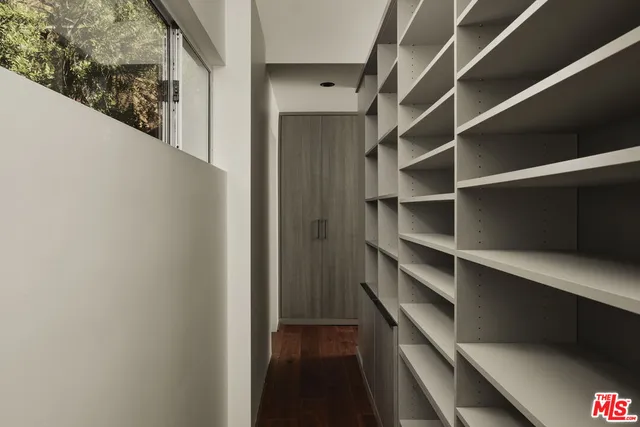 a bathroom with a shower and a curtain