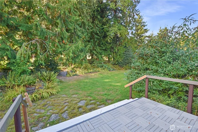 a garden view with a seating space