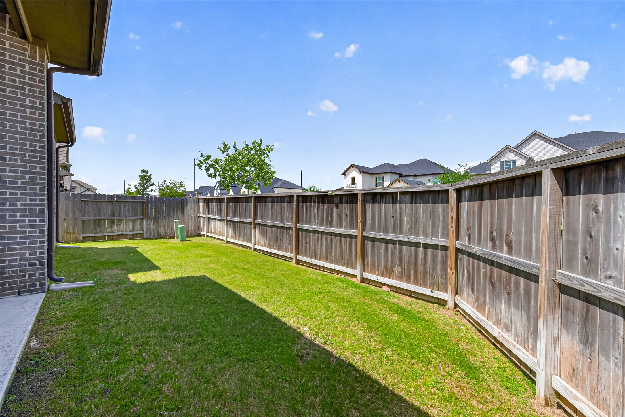 20802 Mirror Point Drive Cypress, TX 77433 - Photo 35 of 37 The fenced backyard provides a private outdoor space, perfect for relaxation and recreation. It offers a secure and enjoyable area for residents and their pets.