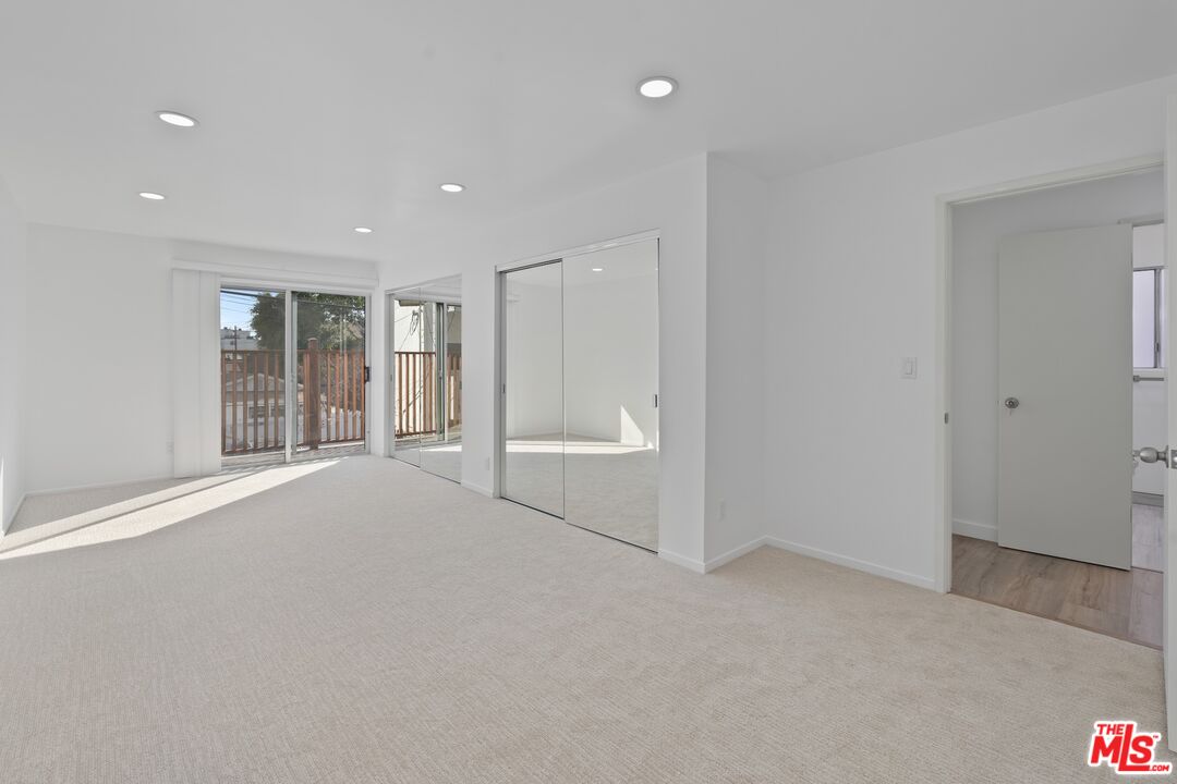 122 Buccaneer Street, Unit 3 Marina del Rey, CA 90292 - Photo 16 of 31 a view of an empty room with a window
