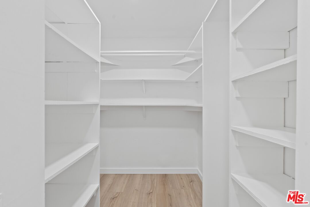 122 Buccaneer Street, Unit 3 Marina del Rey, CA 90292 - Photo 18 of 31 a view of walk in closet with empty racks