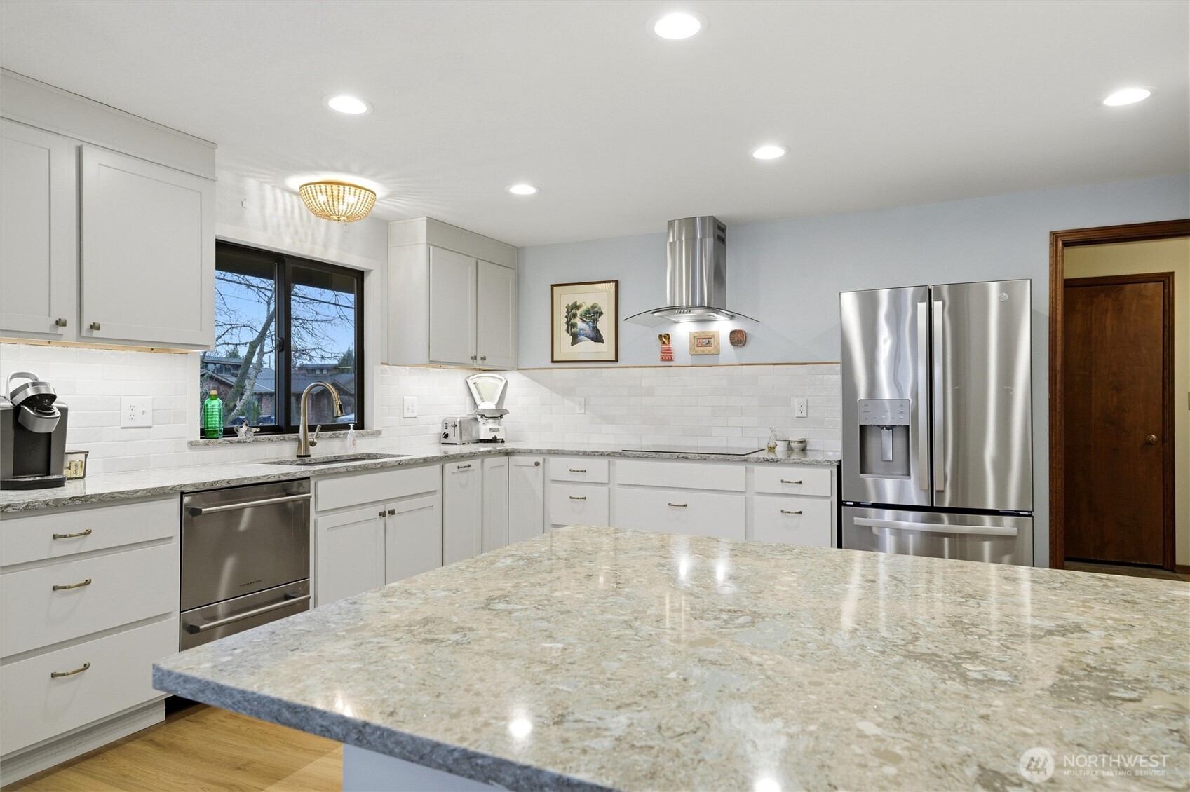 1390 Highland Road Walla Walla, WA 99362 - Photo 11 of 40 a kitchen with granite countertop a refrigerator stove top oven and sink