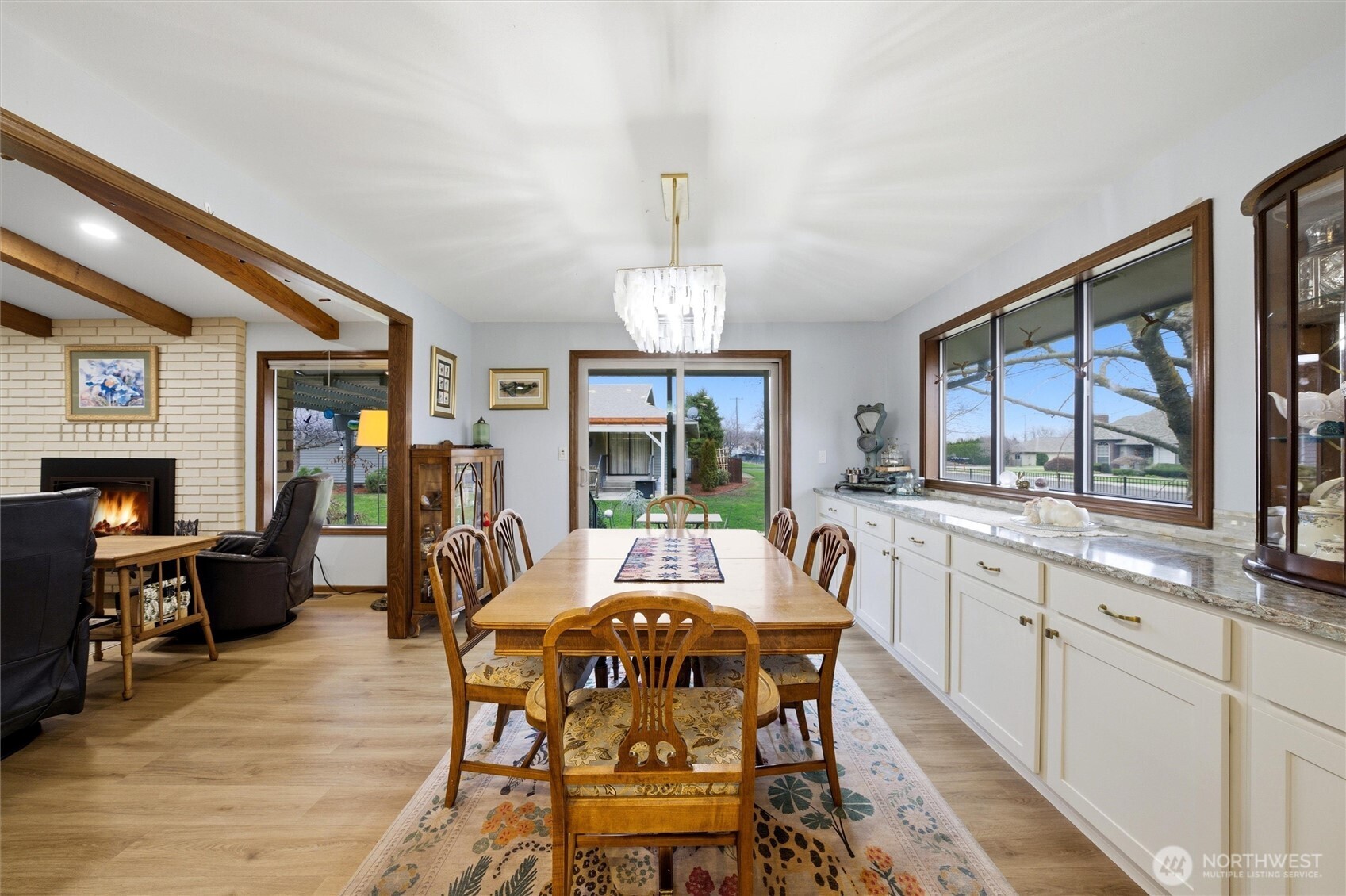 1390 Highland Road Walla Walla, WA 99362 - Photo 12 of 40 a view of a dining room with furniture window and wooden floor