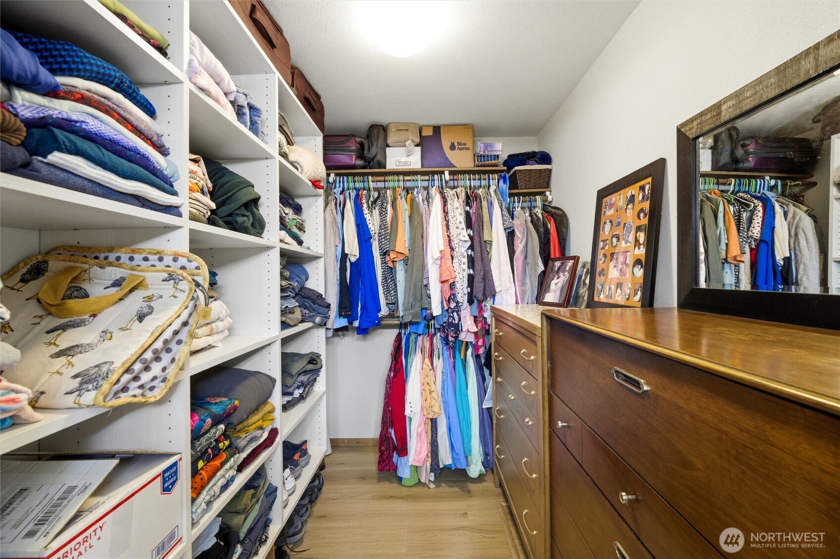 1390 Highland Road Walla Walla, WA 99362 - Photo 25 of 40 a view of walk in closet with clothes and shoes