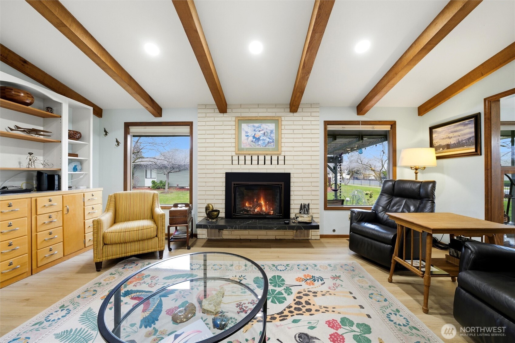 1390 Highland Road Walla Walla, WA 99362 - Photo 8 of 40 a living room with furniture and a fireplace
