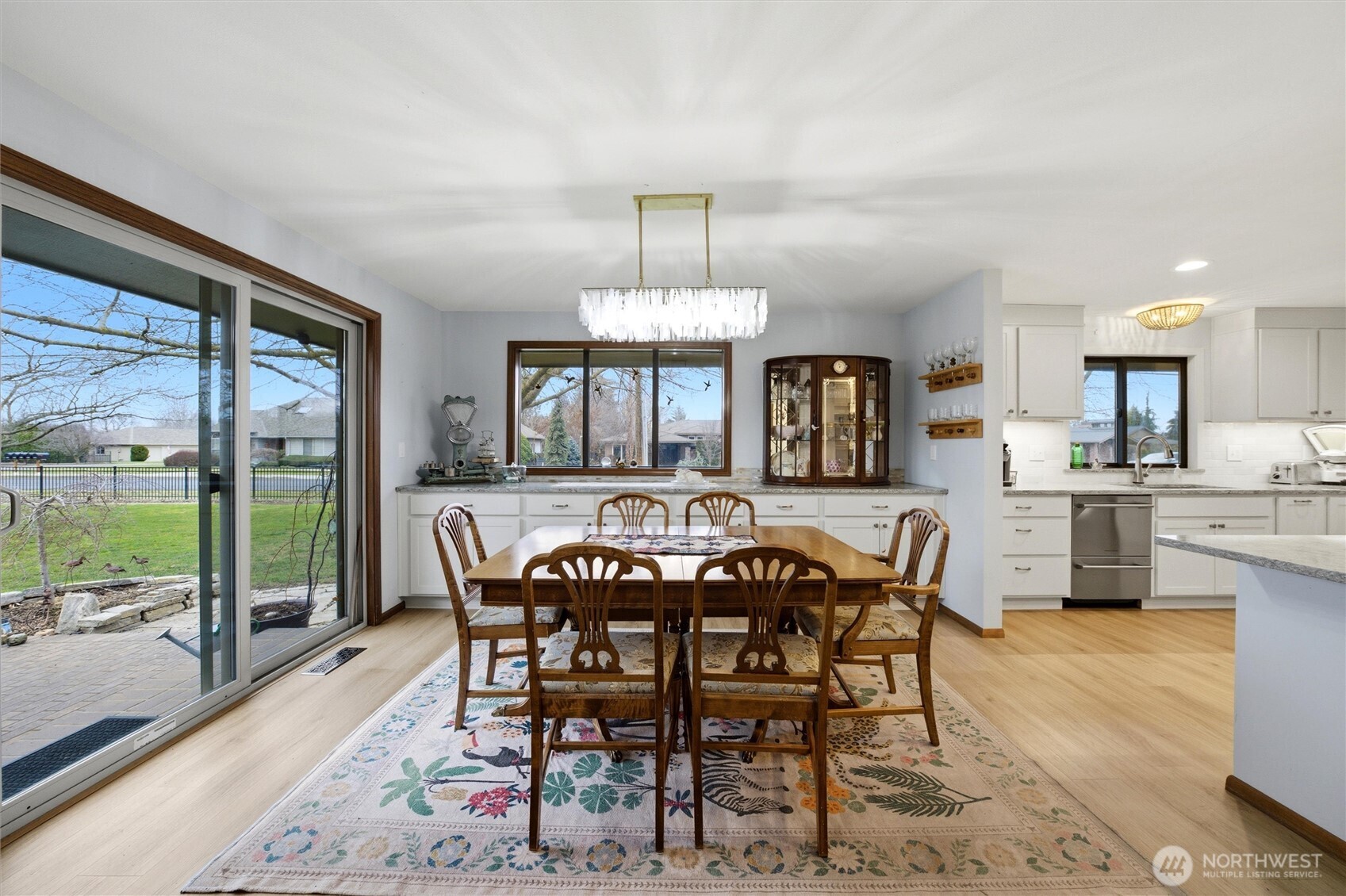 1390 Highland Road Walla Walla, WA 99362 - Photo 10 of 40 a view of a dining room with furniture window and wooden floor
