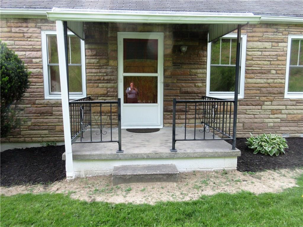 113 Ford City Road Freeport, PA 16229 - Photo 2 of 25 A 9x6' covered front porch and fresh landscaping welcomes you.