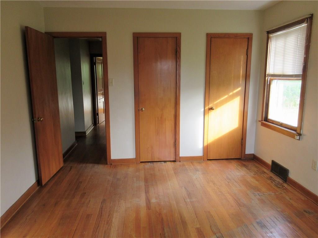 113 Ford City Road Freeport, PA 16229 - Photo 11 of 25 The first floor master bedroom has been freshly painted and offers a hardwood floor and two step in closets.