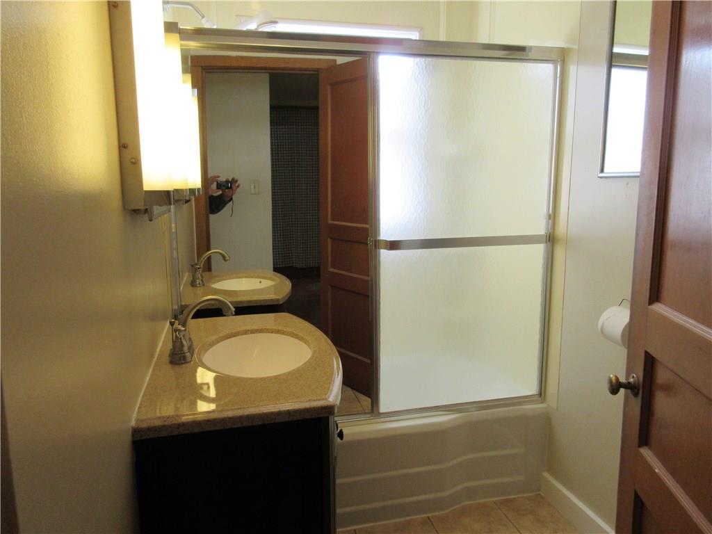 113 Ford City Road Freeport, PA 16229 - Photo 14 of 25 First floor full bathroom with a tub/shower unit.