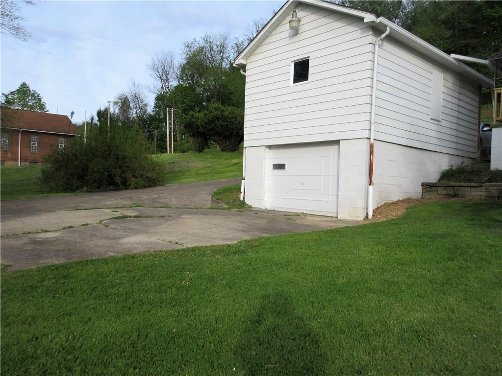 113 Ford City Road Freeport, PA 16229 - Photo 22 of 25 Lower level of garage can be easily accessed with the cement driveway.