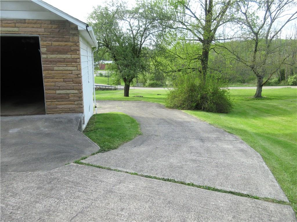 113 Ford City Road Freeport, PA 16229 - Photo 23 of 25 Convenient, cement driveway access to the back of the home!