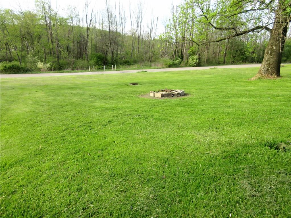 113 Ford City Road Freeport, PA 16229 - Photo 25 of 25 Additional view of yard showing the fire pit.