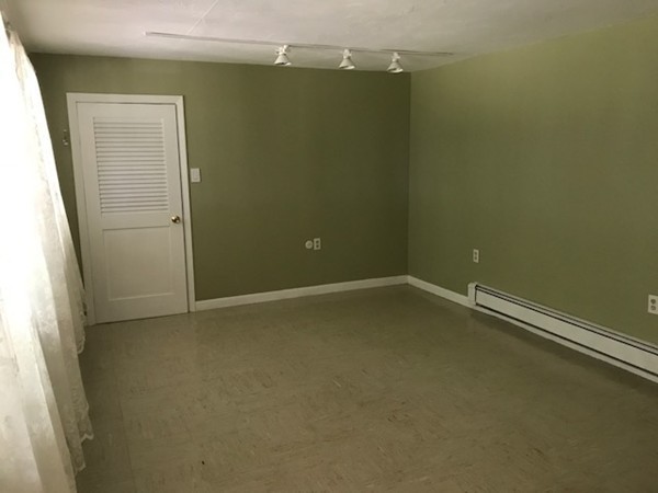970 Bearsden Road Athol, MA 01331 - Photo 22 of 30 an empty room with a door