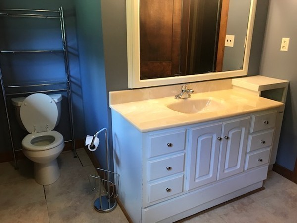 970 Bearsden Road Athol, MA 01331 - Photo 26 of 30 a bathroom with a granite countertop toilet and a sink