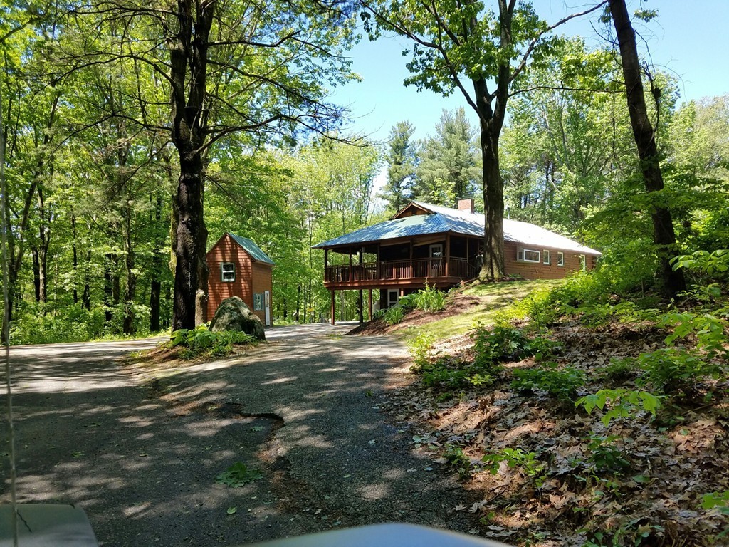 970 Bearsden Road Athol, MA 01331 - Photo 3 of 30 a front view of a house with a yard and trees