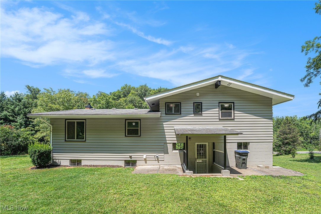 9424 Brookside Road Independence, OH 44131 - Photo 15 of 21 Rear exterior with two small patios.