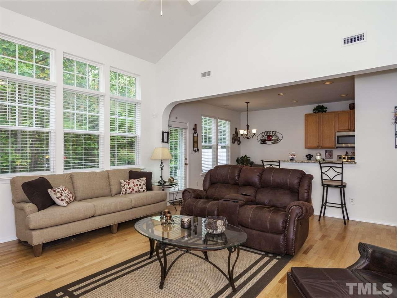 8506 Slabstone Court Raleigh, NC 27613 - Photo 23 of 25 a living room with furniture and a large window