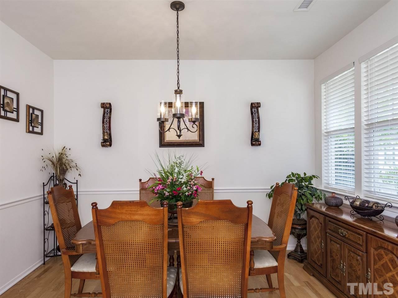 8506 Slabstone Court Raleigh, NC 27613 - Photo 4 of 25 a dining room with furniture and window