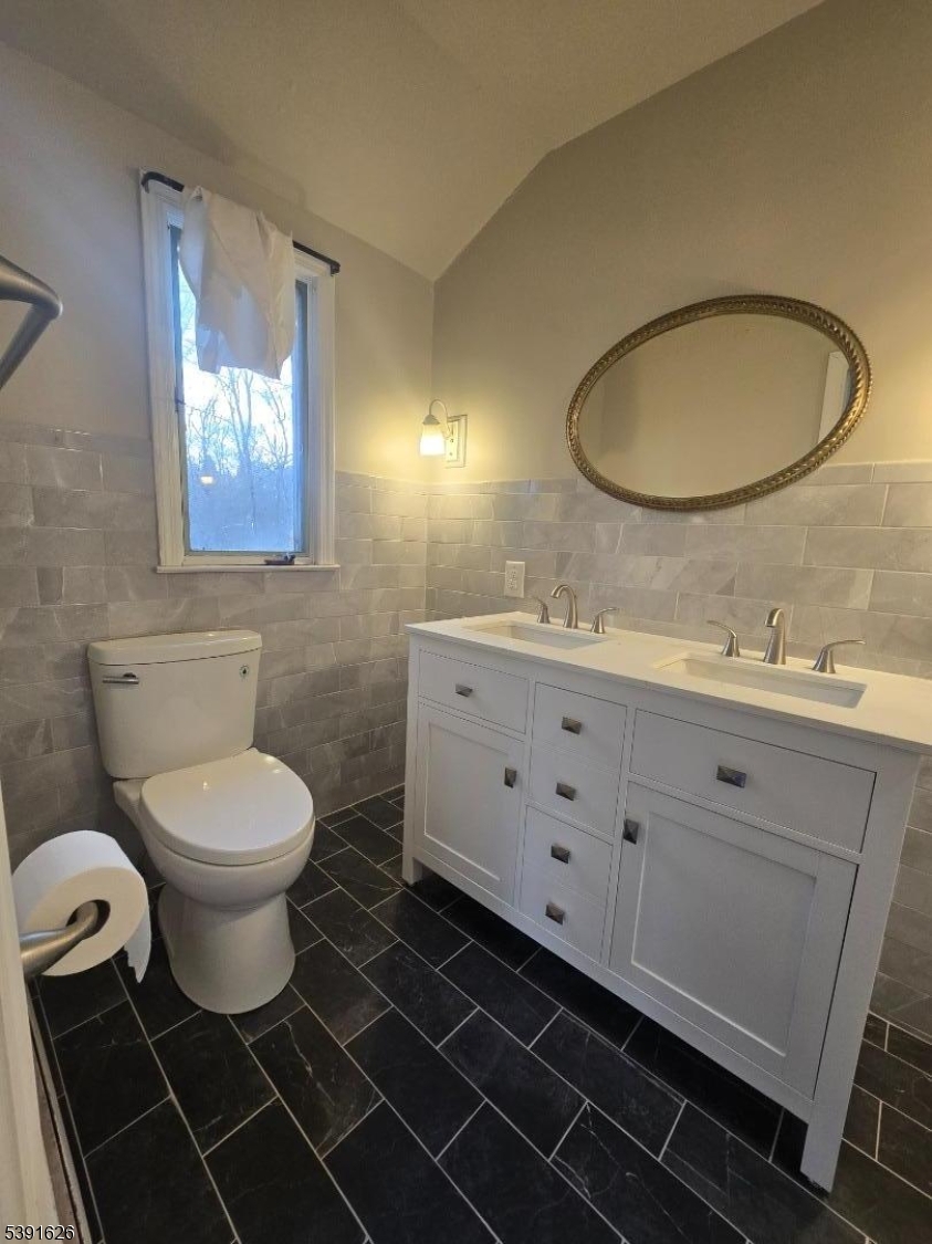 62 Gaston Road Morristown, NJ 07960 - Photo 19 of 23 a bathroom with a toilet a sink and mirror