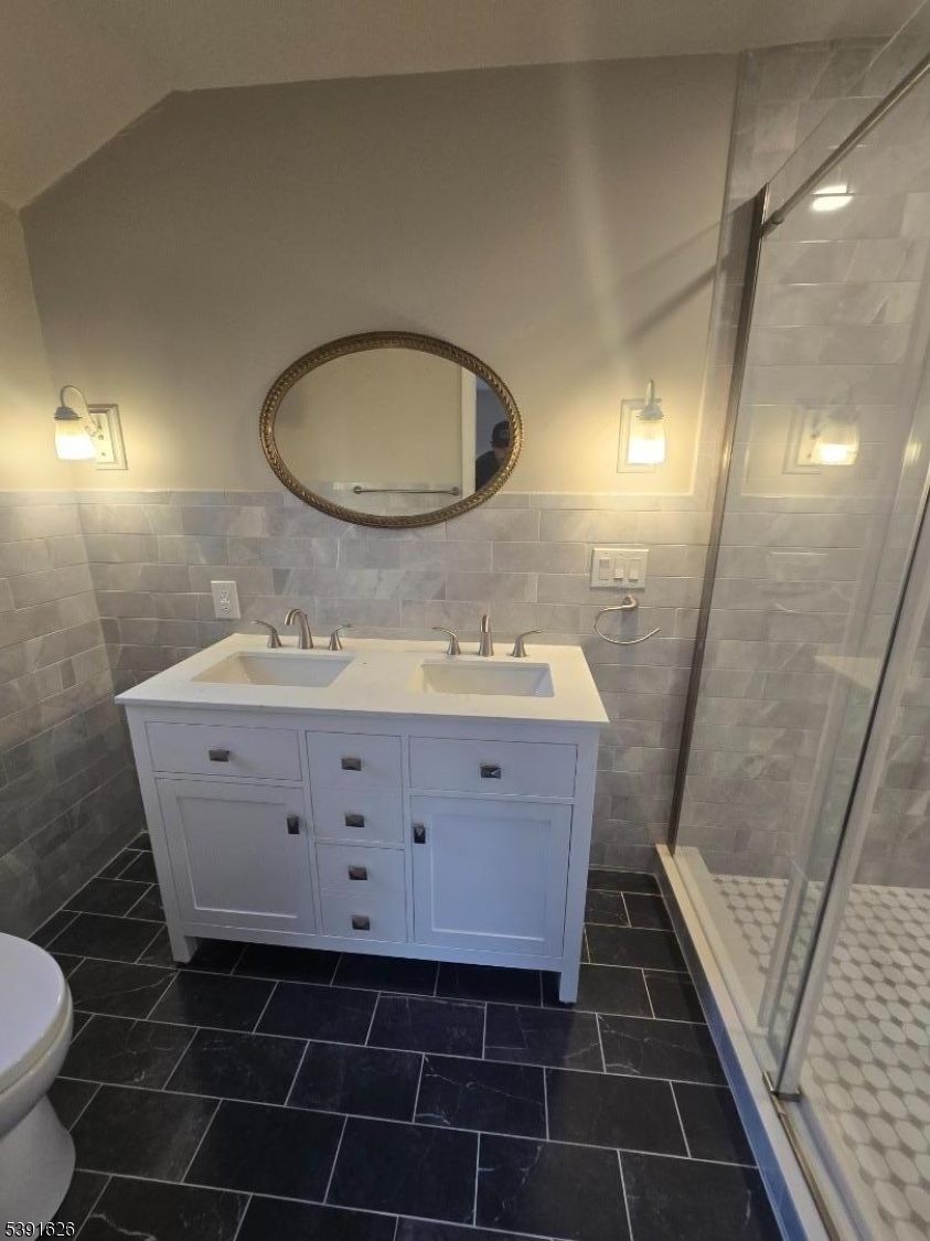 62 Gaston Road Morristown, NJ 07960 - Photo 20 of 23 a bathroom with a sink mirror vanity and toilet