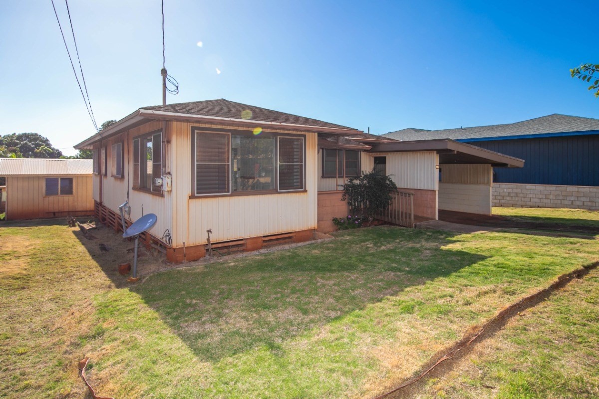 4733 Uliuli Road Eleele, HI 96705 - Photo 4 of 25 a front view of a house with a yard