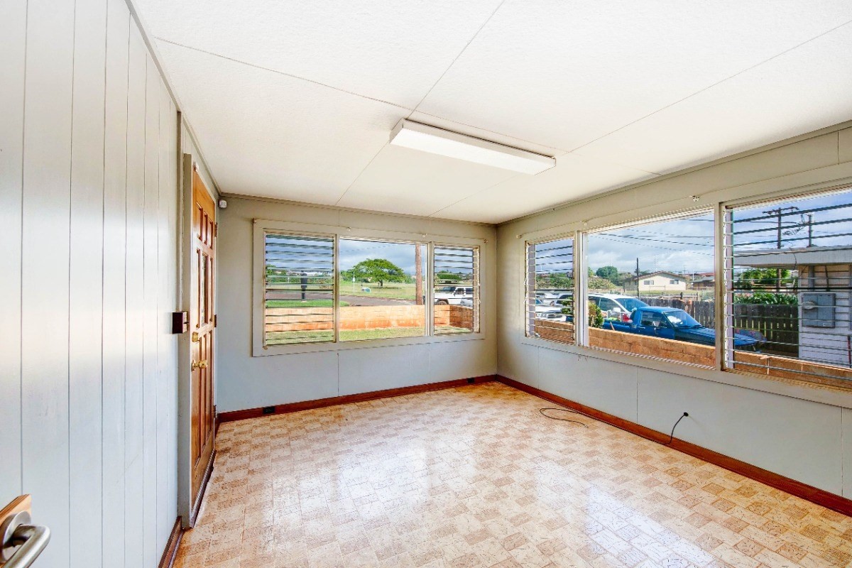 4733 Uliuli Road Eleele, HI 96705 - Photo 9 of 25 a view of an empty room with a window