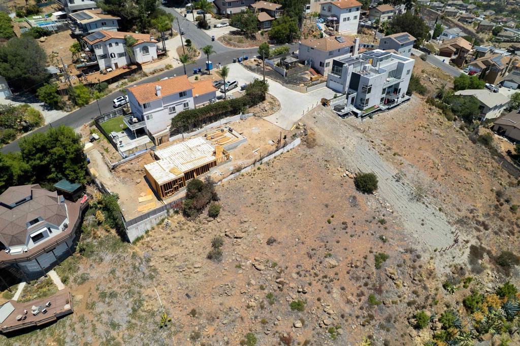 0 La Mesa Avenue Spring Valley, CA 91977 - Photo 9 of 12 an aerial view of a backyard with parking space and parking space