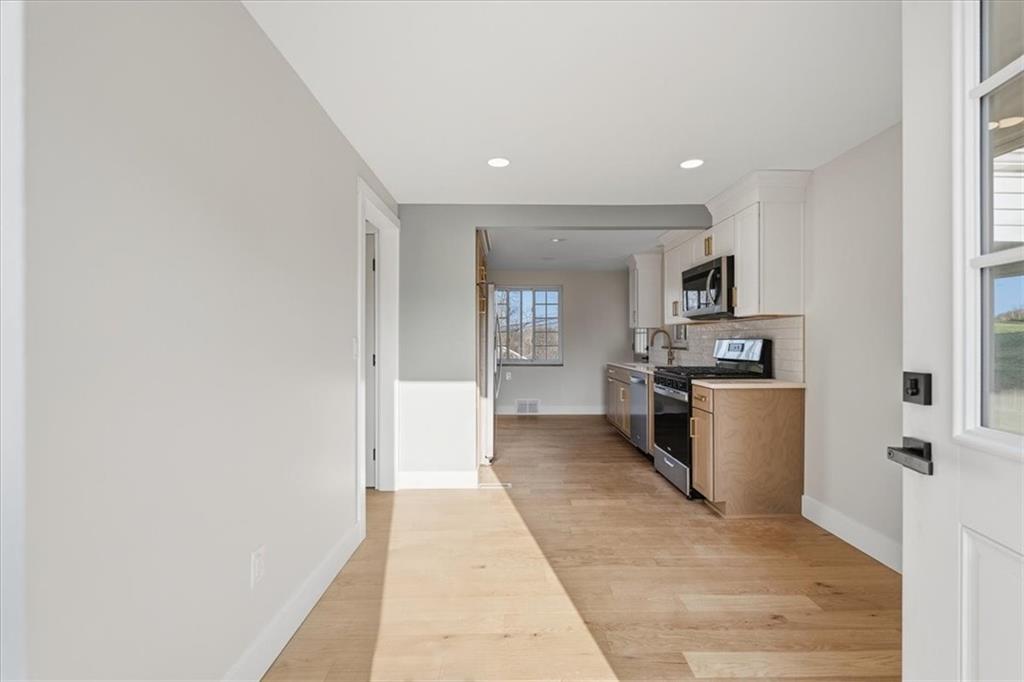 44 Ruthfred Drive Pittsburgh, PA 15241 - Photo 20 of 29 a large kitchen with cabinets