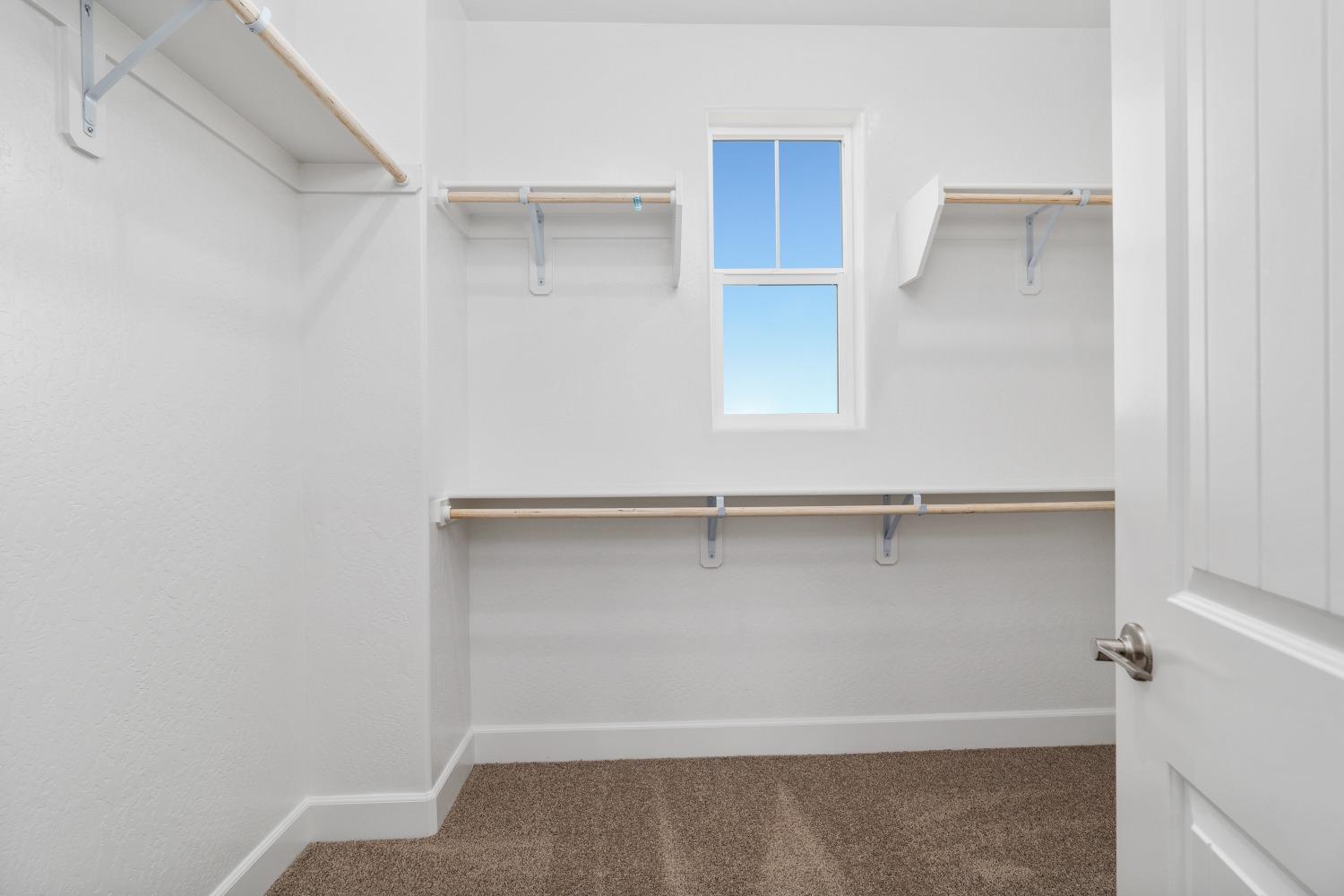 321 Peters Road Madera, CA 93636 - Photo 17 of 33 a view of an empty walk in closet