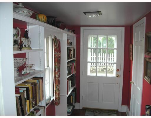 Undisclosed Address Rowayton, CT 06853 - Photo 3 of 10 a view of walk in closet with clothes and shoes