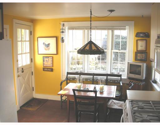 Undisclosed Address Rowayton, CT 06853 - Photo 8 of 10 a living room with a table and a chandelier