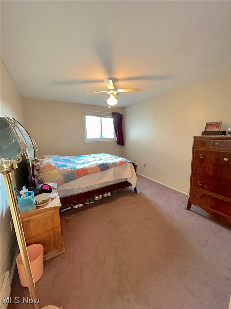 8753 West Ridge Road, Unit A Elyria, OH 44035 - Photo 14 of 21 Bedroom 1 with carpet and ceiling fan