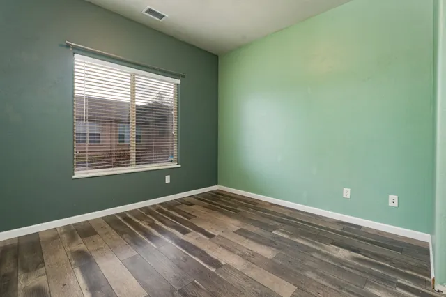 a view of a room with windows