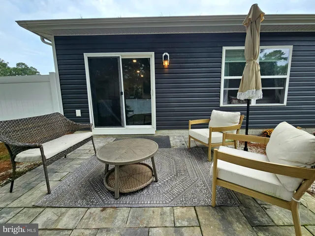 a building outdoor space with patio furniture