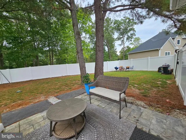 a view of a swimming pool with a lounge chairs