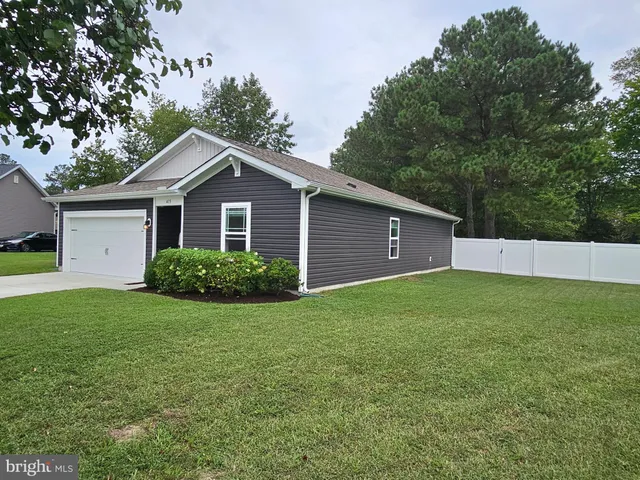 a view of a backyard with a garden