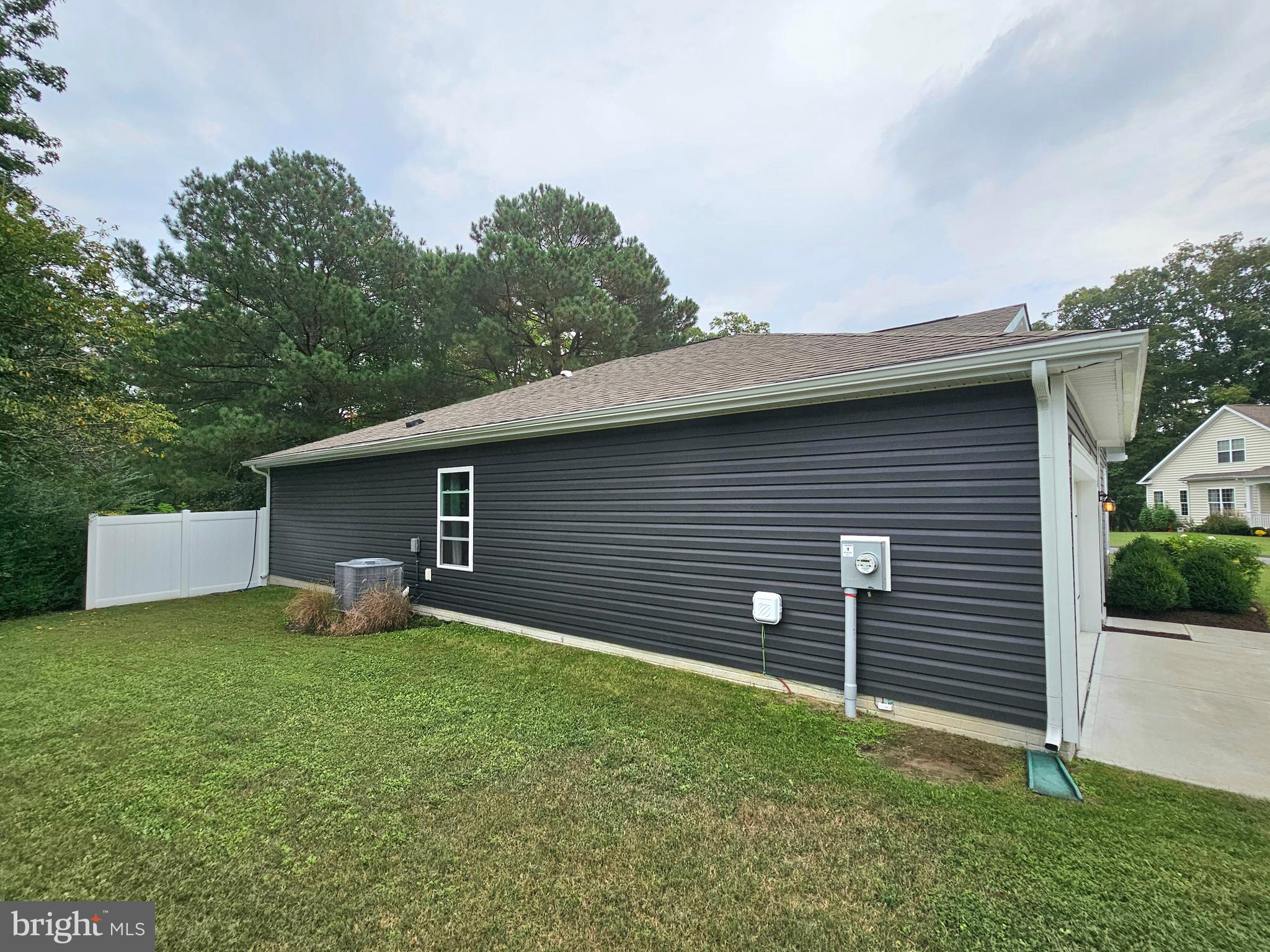 415 Creekside Trail Fruitland, MD 21826 - Photo 34 of 41 a backyard of a house with yard and garage