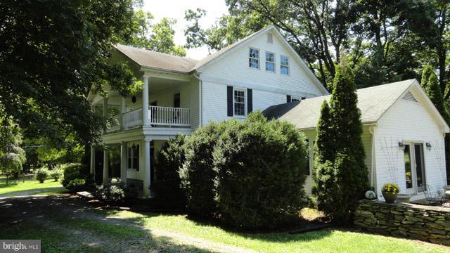 837 Leetown Road Summit Point, WV 25446 - Photo 3 of 30 front view of a house with a yard