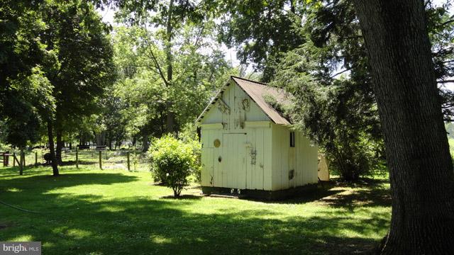 837 Leetown Road Summit Point, WV 25446 - Photo 23 of 30 a view of an house with backyard space and garden