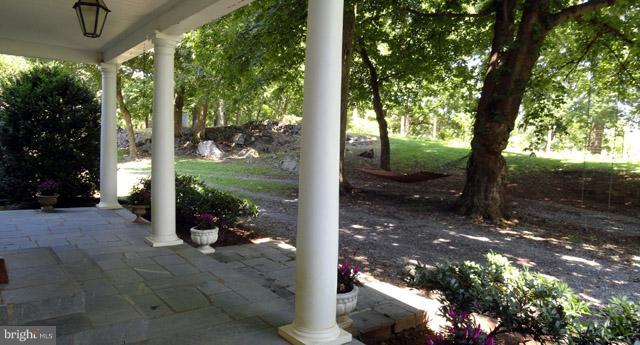 837 Leetown Road Summit Point, WV 25446 - Photo 5 of 30 a view of a porch with garden