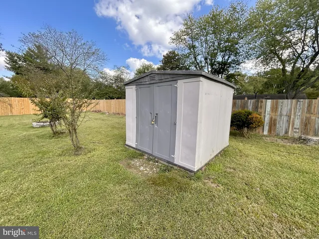 a view of a yard with an outdoor space
