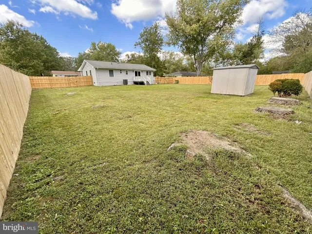 a view of a backyard with a garden
