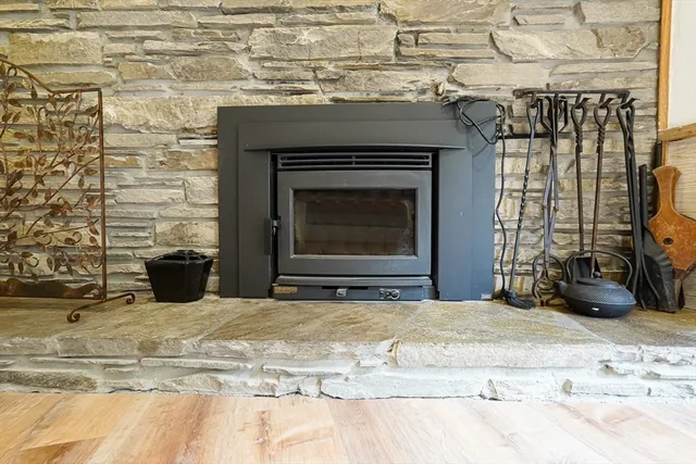 a view of water heater and fireplace