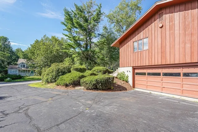 a view of backyard with green space