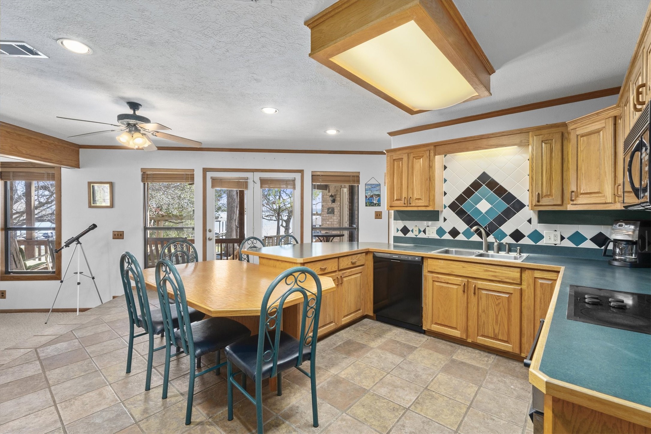 241 Harbour Point Circle Coldspring, TX 77331 - Photo 15 of 33 Large bright kitchen with built-in dining.