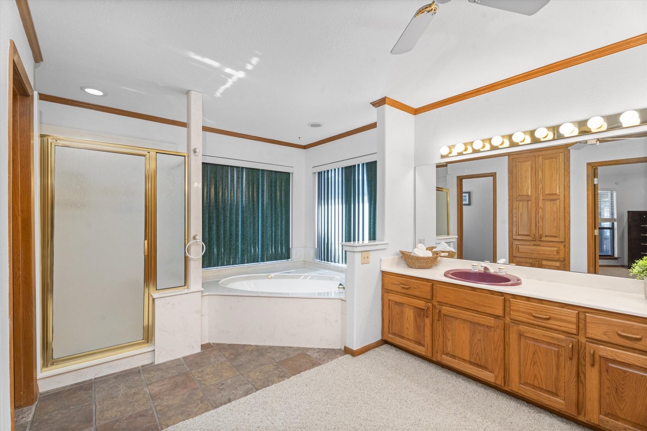 241 Harbour Point Circle Coldspring, TX 77331 - Photo 22 of 33 Primary ensuite bathroom with separate tub and shower.