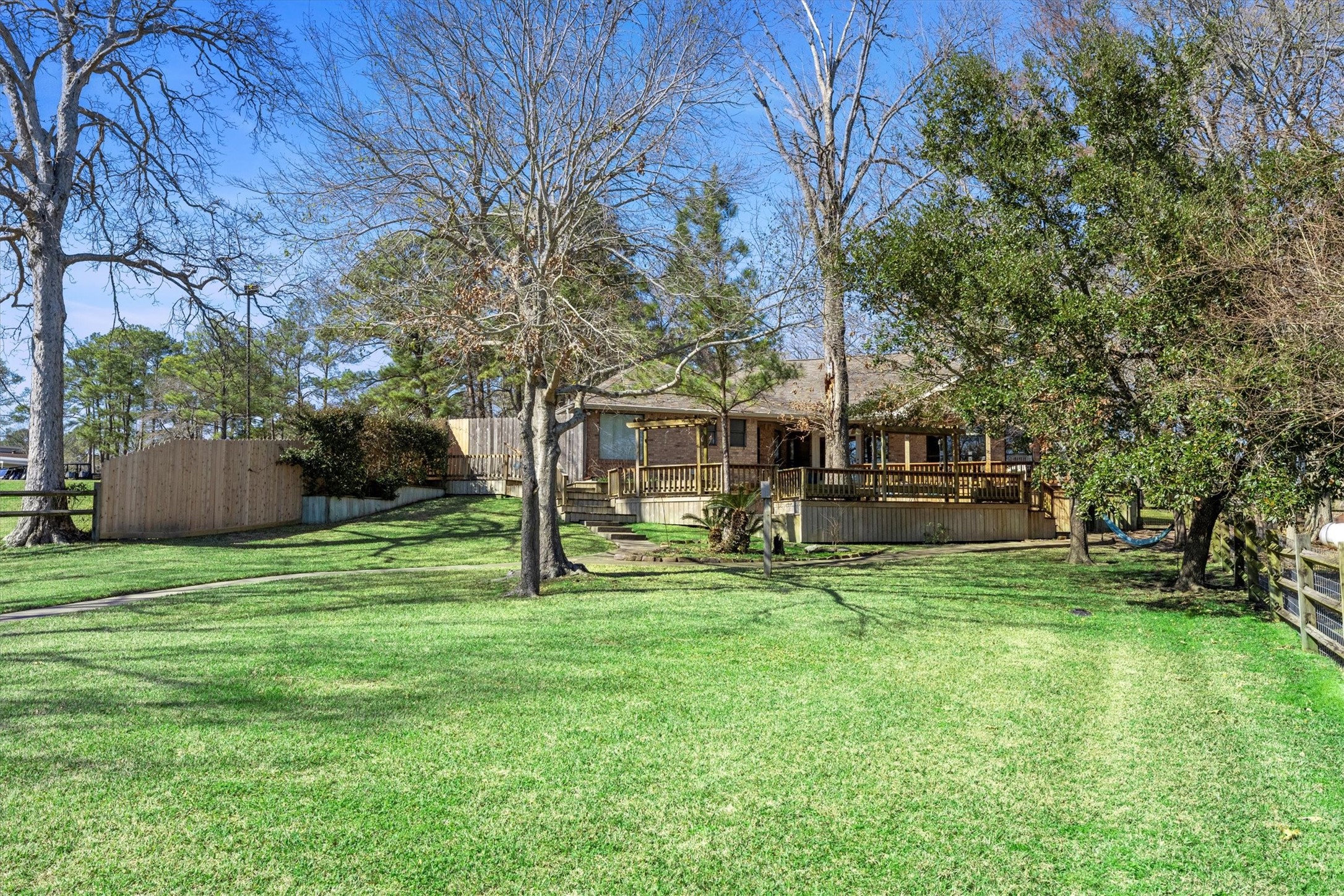 241 Harbour Point Circle Coldspring, TX 77331 - Photo 5 of 33 Large back fenced back yard.